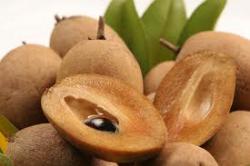 Sapodilla cut and whole. Sapodilla cut and whole.
